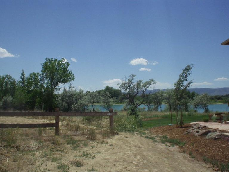 A trail leading down to trees by Richards Lake in north Fort Collins. 