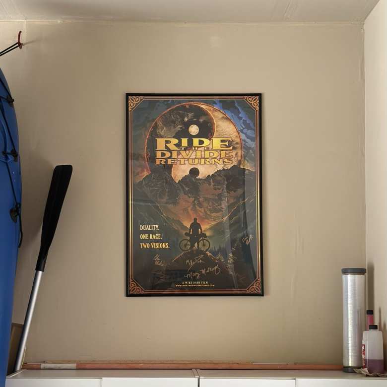 A Ride the Divide Returns poster in my garage.