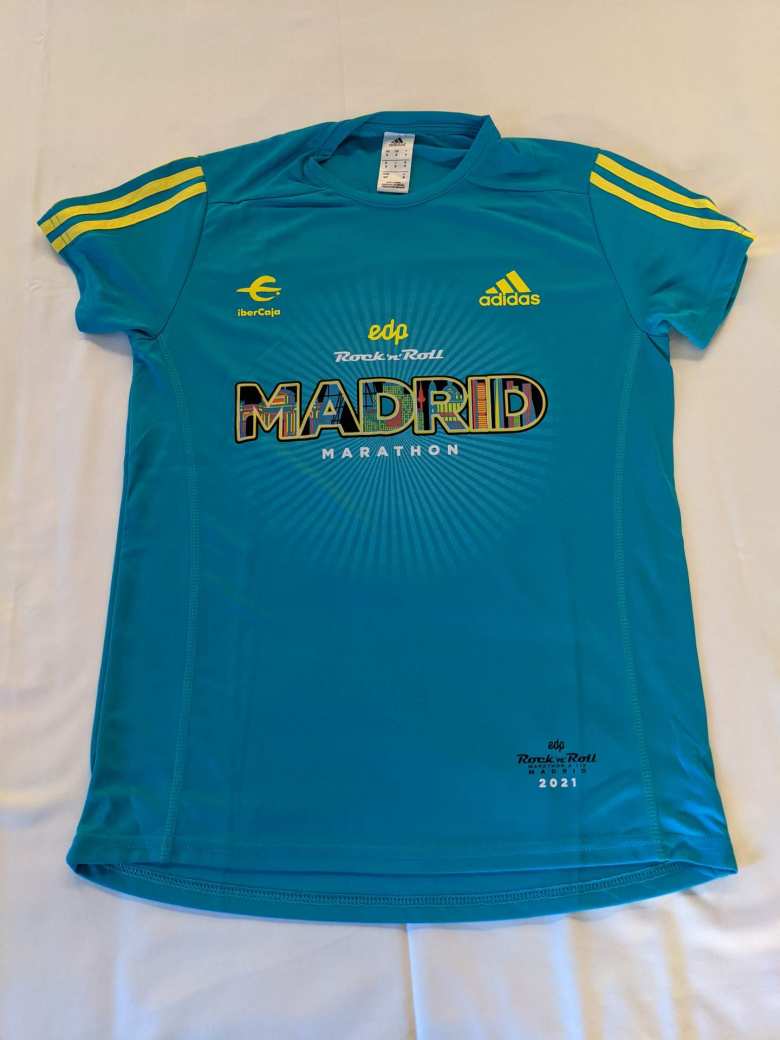 A green tech shirt was included with registration for the 2021 Rock 'n' Roll Madrid Marathon.