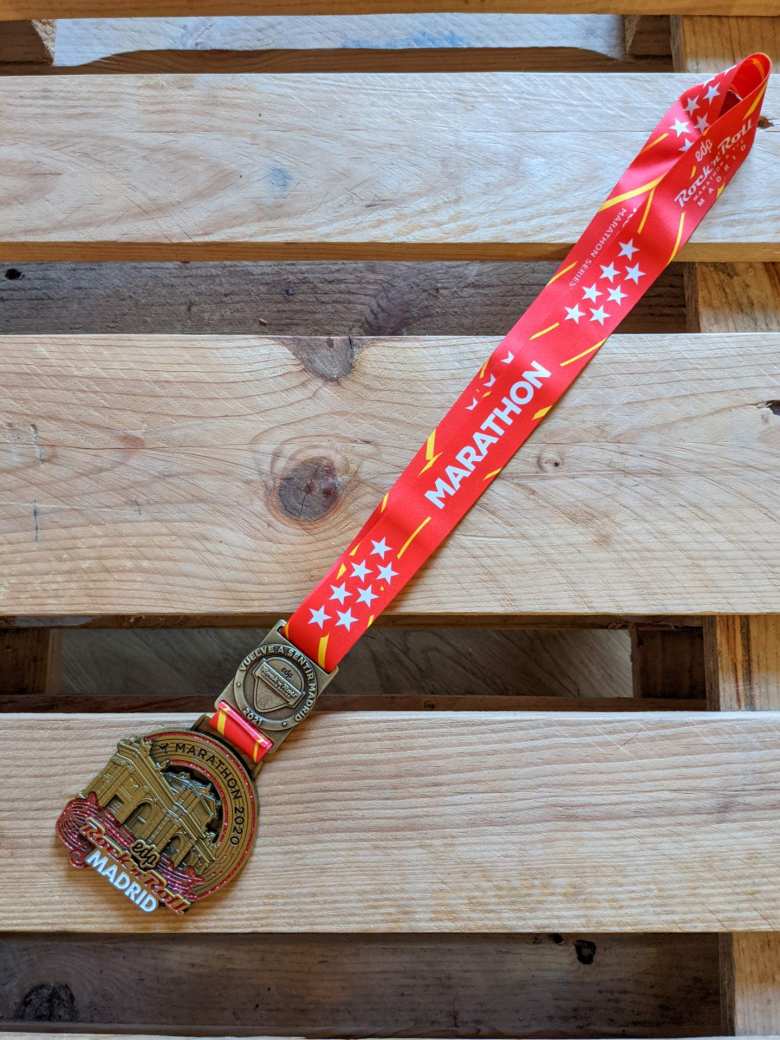 The finisher's medal for the Rock 'n' Roll Madrid Marathon.
