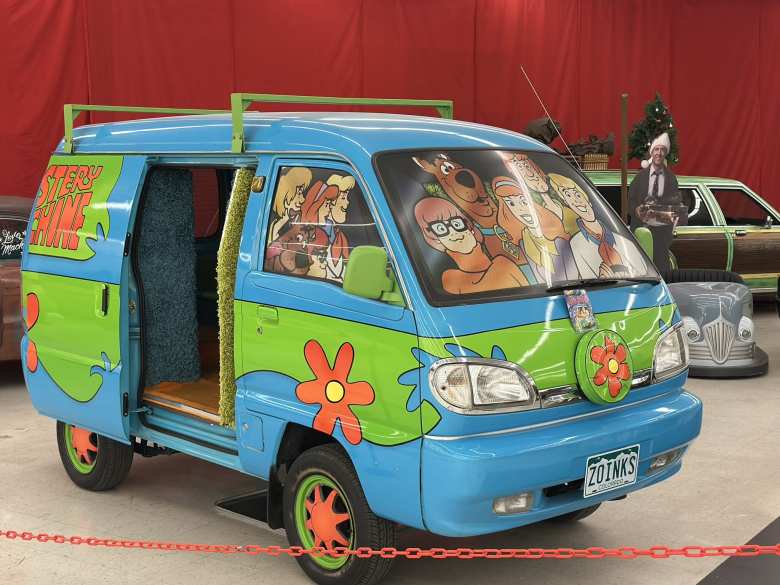 A small replica of the Mystery Machine from the Scooby Doo cartoons. A small replica of the Mystery Machine from the Scooby Doo cartoons.