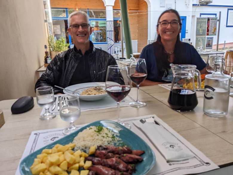 Dave and Tori at Restaurante O Lourenco. I ate diced potatoes, squid, and rice for dinner.