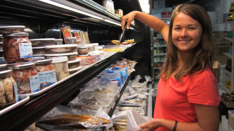 Katia picking out some fried anchovies.
