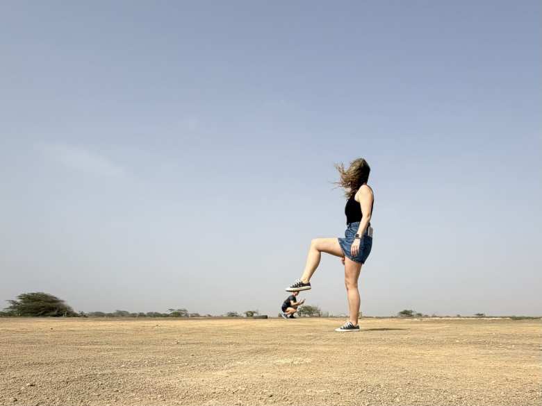 We stopped in Terra Boa, where the heat and dry air contribute to being able to see a mirage of water. Andrea pretended to step on me in this photo.