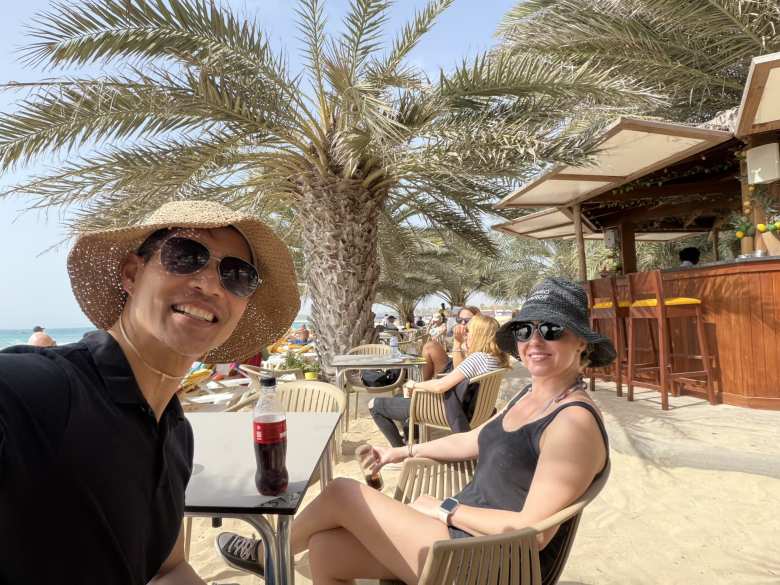 Felix and Andrea enjoying drinks by the Santa Maria beach before transferring to the Hilton Resort.