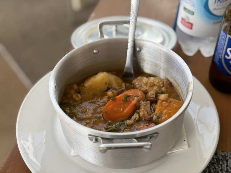 Cachupa is the  with Portuguese roots that contains root vegetables, corn, meat, and spices. We ate this at the Cultural Café in Santa Maria.