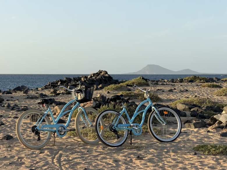 Our beach cruiser bikes with Monte Leão in the background.