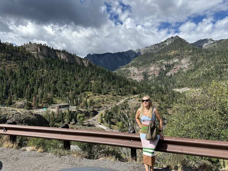 Andrea at the Switzerland of America Lookout Point south of Ouray.