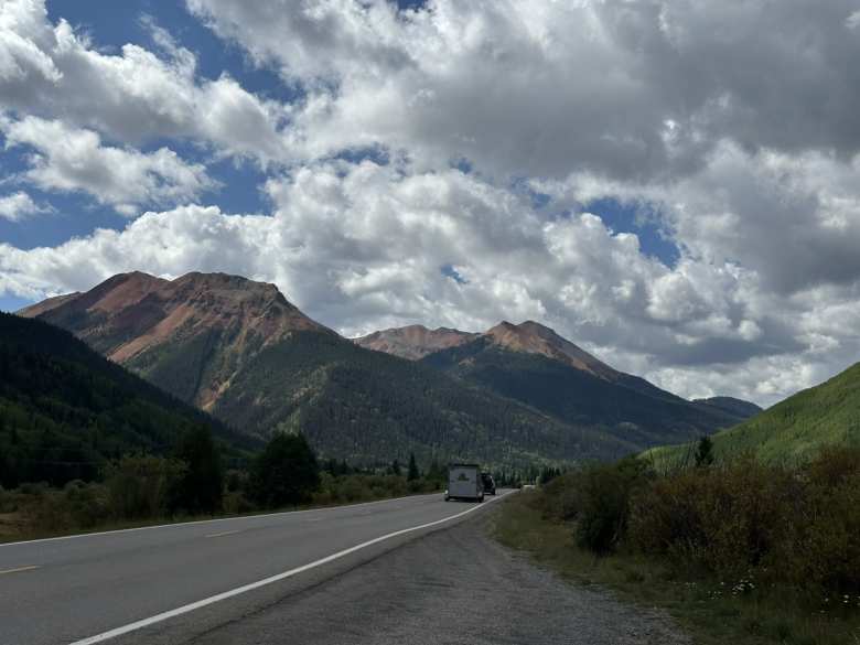 Driving by the Red Mountains in the San Juan Mountains of Colorado along U.S. Highway 550 between Ouray and Silverton.