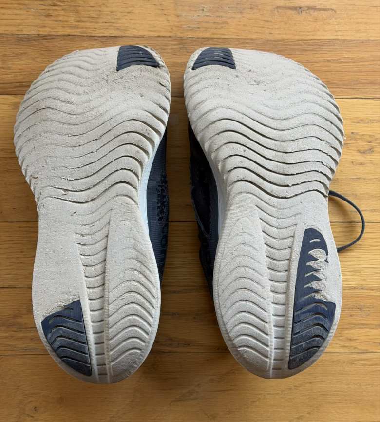 Wear on the soles of Saucony Kinvara 15 shoes after 653 miles.