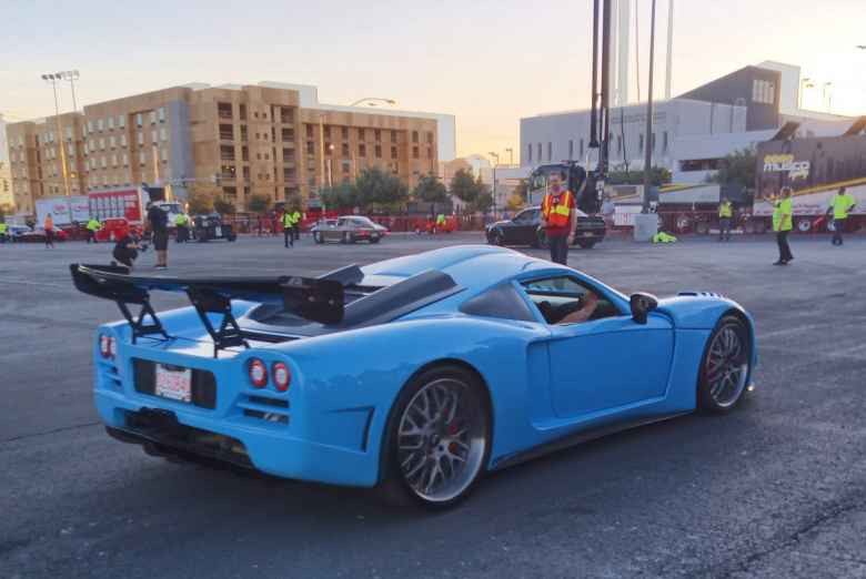 A light blue sports car with a black wing. If anyone knows what this is, please drop me a line.