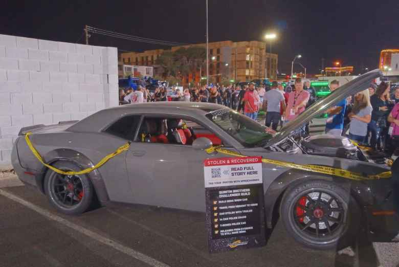 This 1000+ horsepower Dodge Challenger built by Quintin Brothers Auto and Performance in Vermont was stolen in Las Vegas days before SEMA. It was crashed and then recovered by police, and put on display at SEMA.