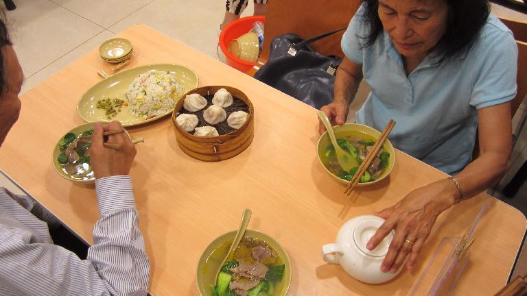 Having a nice low-key dinner with my folks, including soup, rice and dumplings.