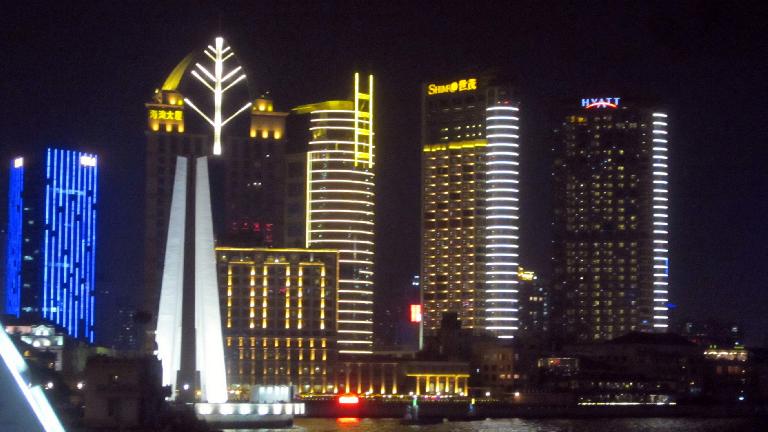 The Bund side of the Huangpu River at night.