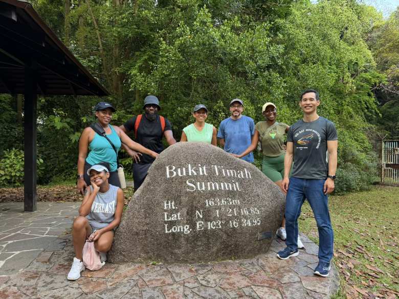 MJ, Sophia, Olby, Leanne, James, Mandy, and Felix at the Bukit Timah Summit, elevation 163.63m.