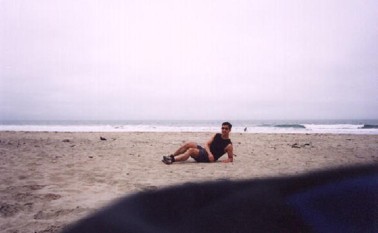 Mile 14: Felix Wong relaxing on the beach.