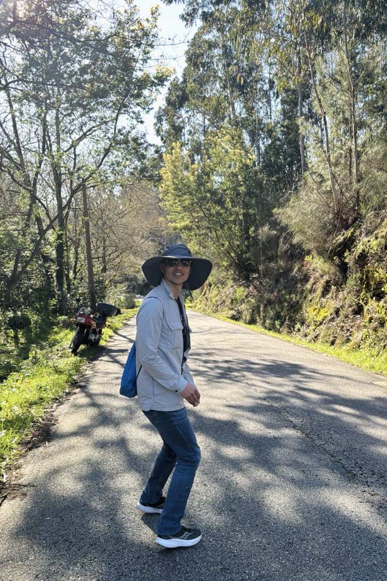 Felix wearing a sun hat on a road in Soutomaior.