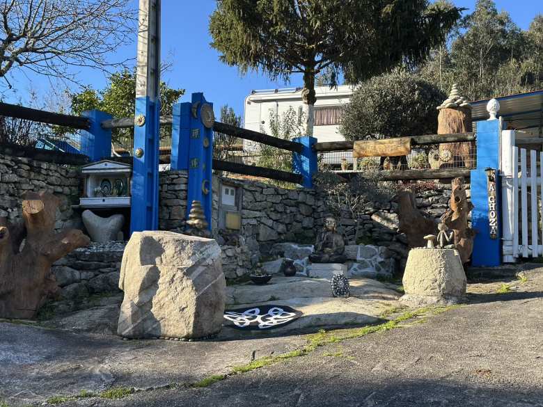 A Buddhist tribute outside one of the residences in Soutomaior.