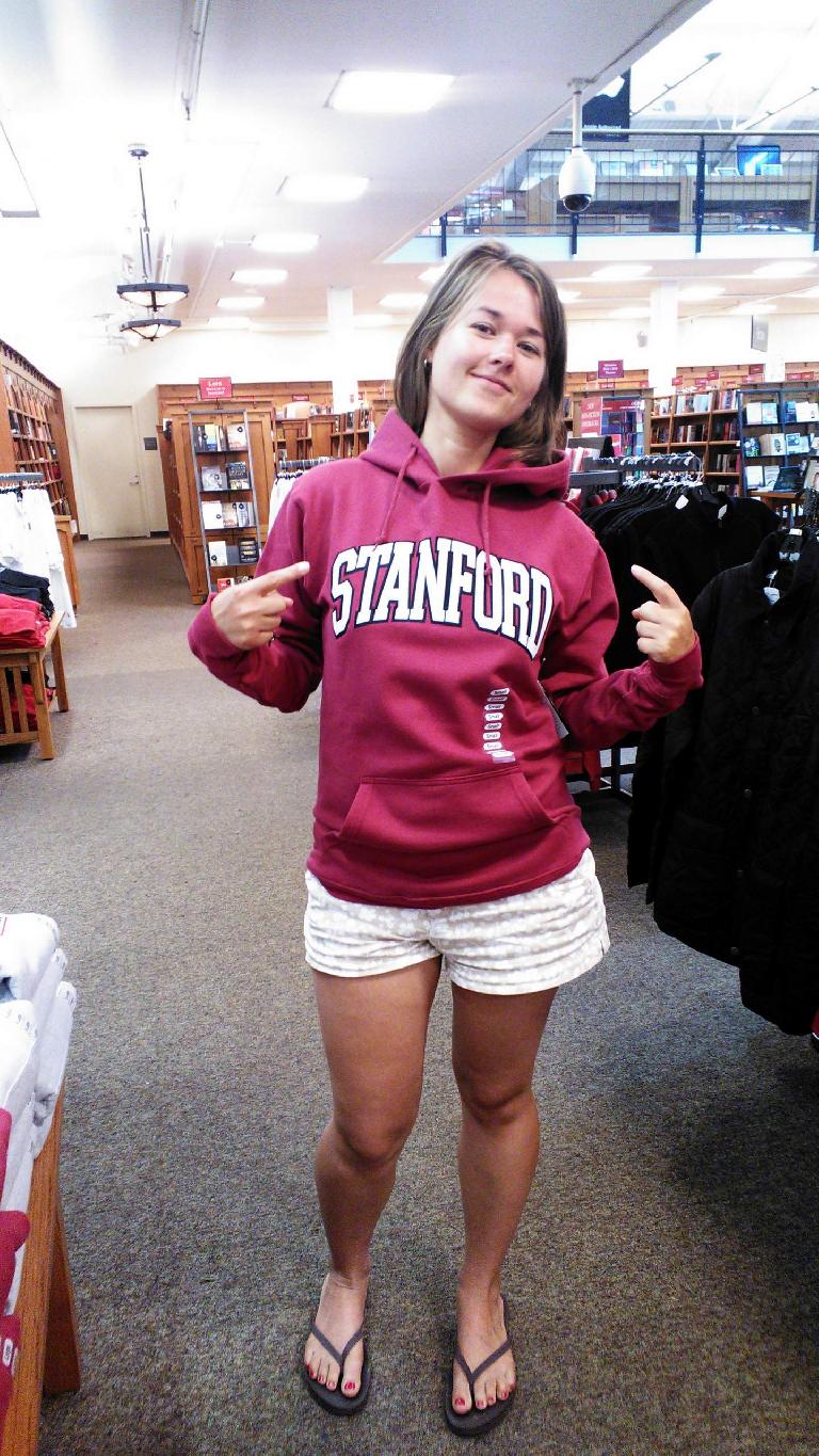 Katia trying on a Stanford sweatshirt.