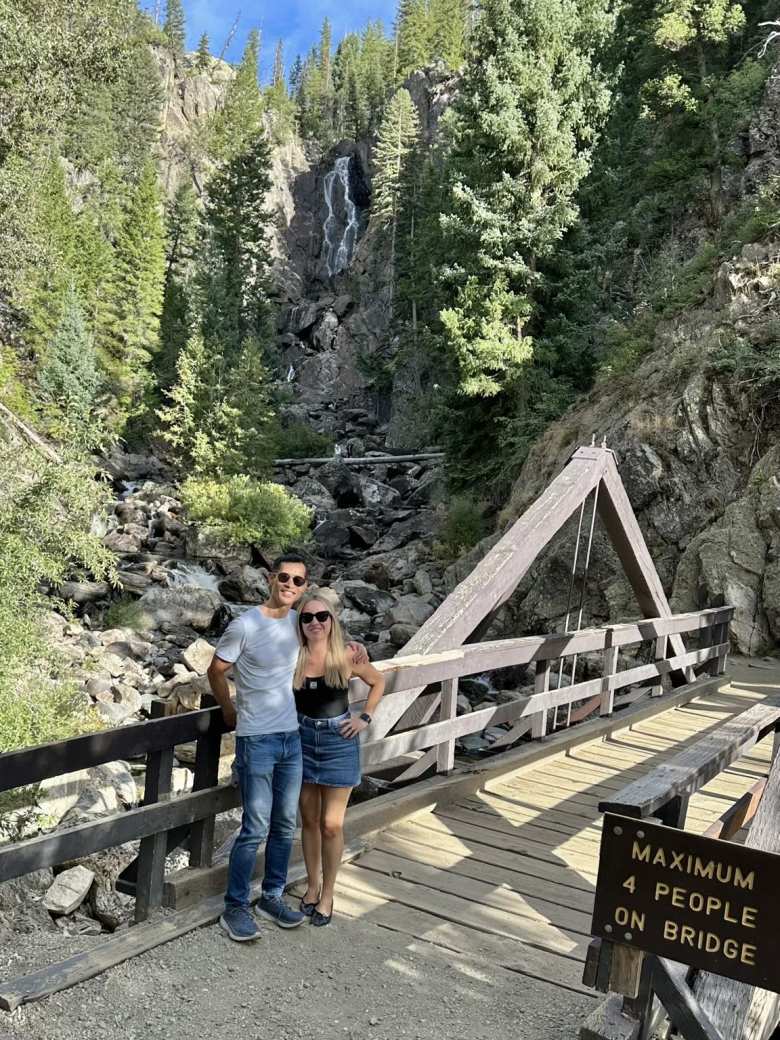 Felix and Andrea on a bridge at Fish Creek Falls.