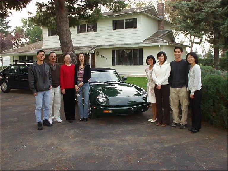 My relatives and I in front of my mom and dad's home of 27 years and my Alfa Romeo.  That's me, Uncle Ronald, Auntie Stella, Cousin Anna, Mom, Sister-in-law Chika, Brother Abiel, and Cousin Cindy.