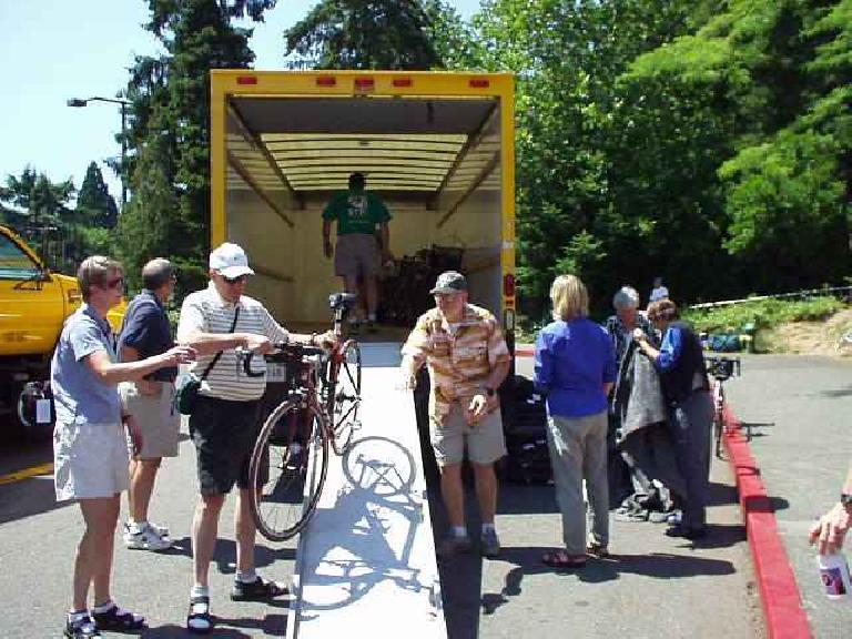 There were moving trucks to take our bikes from downtown Portland to the University of Washington the day before the ride.  People were transported in a tour bus.