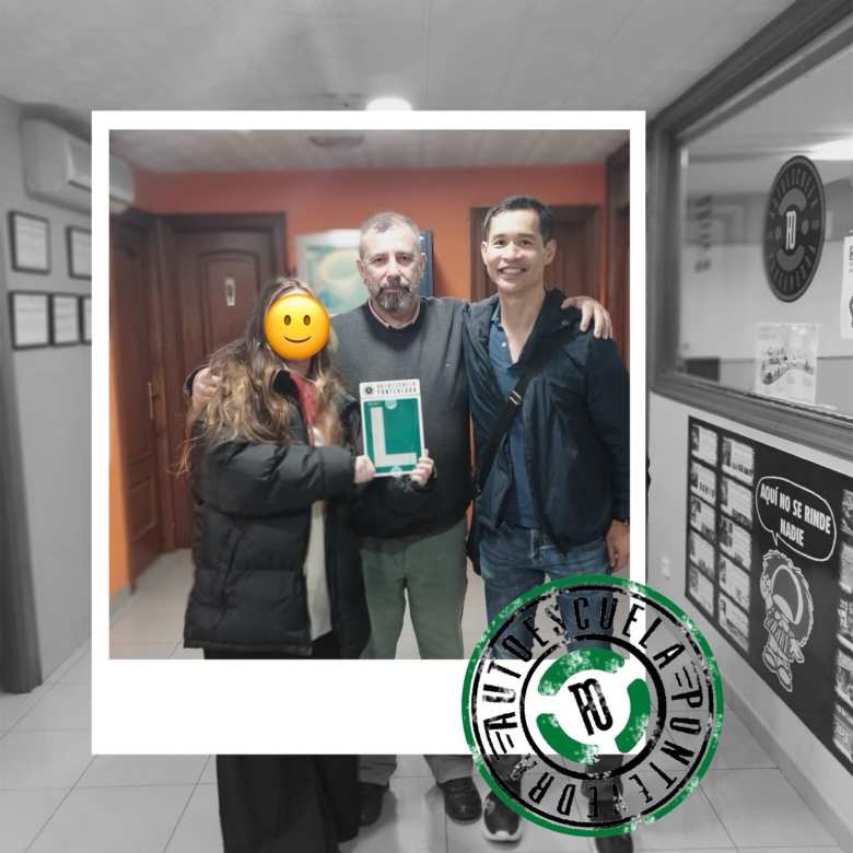 Another student, instructor Juan, and me inside the Autoescuela Pontevedra office after passing the practical Spanish driver's license exam.