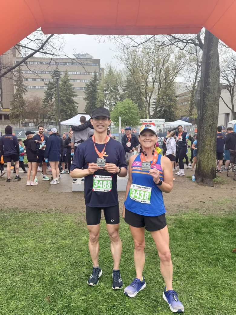 Me and my friend Mel with our medals for finishing the Sudbury Rocks Half Marathon.