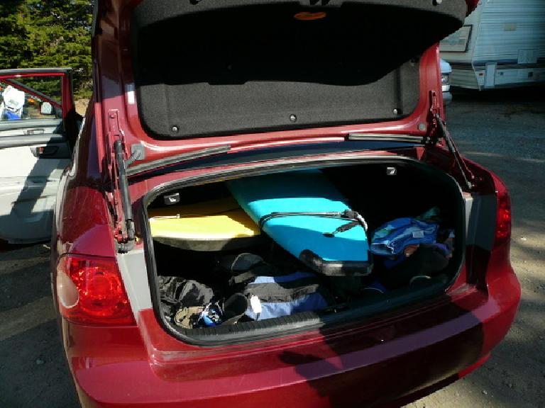 In Watsonville, Adrian and I rented a surfboard.  Amazingly it fit in the Kia Optima rental car.