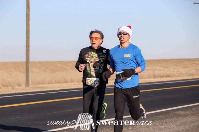 James Cotter and Felix Wong briefly running side-by-side during the Sweaty Sweater 4 Mile.