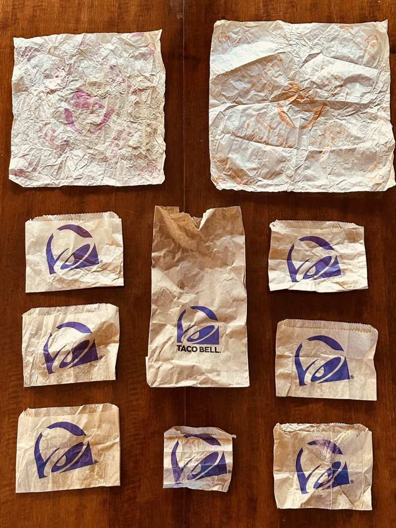 The wrappers from the food I ate at the Taco Bells.