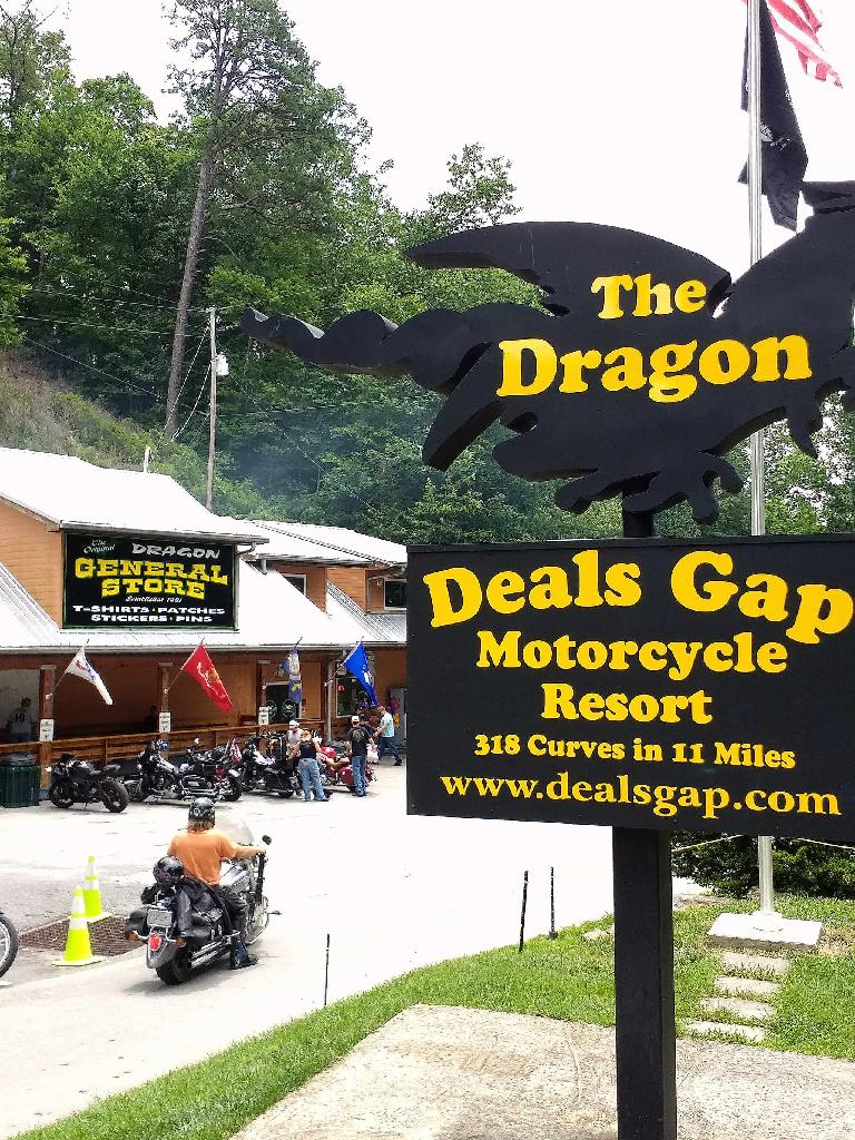 Deals Gap Motorcycle Resort has a sign stating there are 318 curves in 11 miles on the Tail of the Dragon.