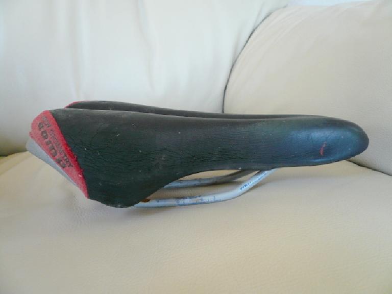 My comfortable Specialized Body Comp saddle from 1999 (which I "borrowed" from my road bike) is very cracked now.  Time for a new saddle.