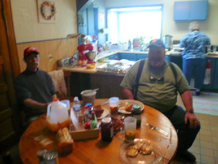 Day 9: In Grant, MT, I stopped by a restaurant that was permanently closed.  Thankfully, the residents nearby -- including Mike (center) and his wife Barbara (right) -- inivited me inside their home for a toast, bacon and egg breakfast.  I also bought some food and water from them.