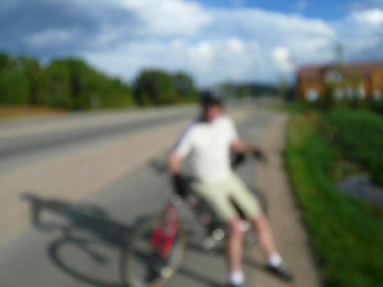 Day 17: In Silverthorne, CO, a local cyclist named Dave met and rode with me.  He was following the Tour Divide online and rode with Leighton White the day before.  (Blurry photo due to camera malfunction.)