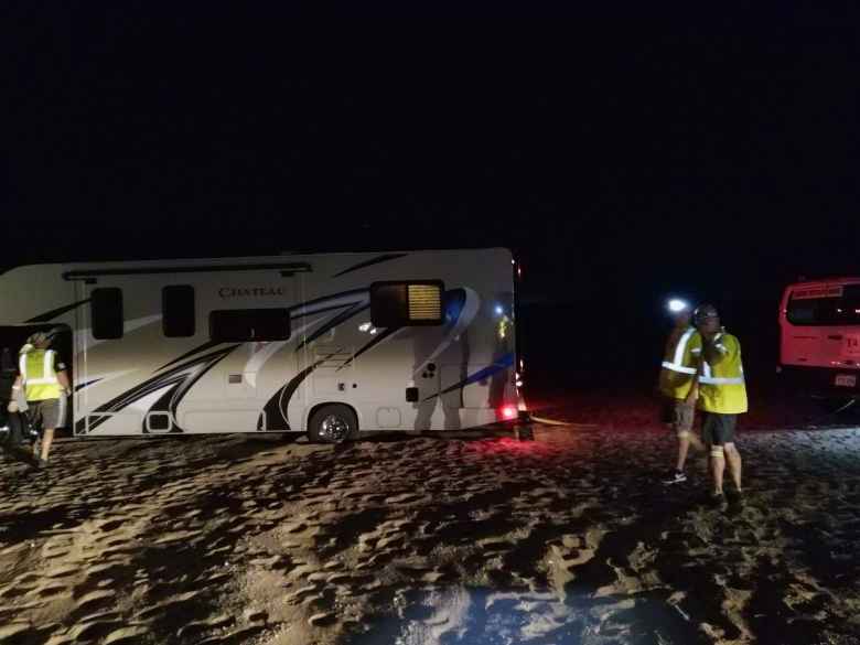 Team Sea to See's big RV that was towing a trailer got stuck in sand in the dessert at night. It took us about 45 minutes to extract it.