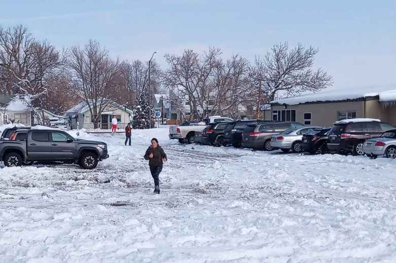 My friend Jennifer finishing her second one-mile run to complete the Thanksgiving Murph at the Fort Collins Athlete Factory.