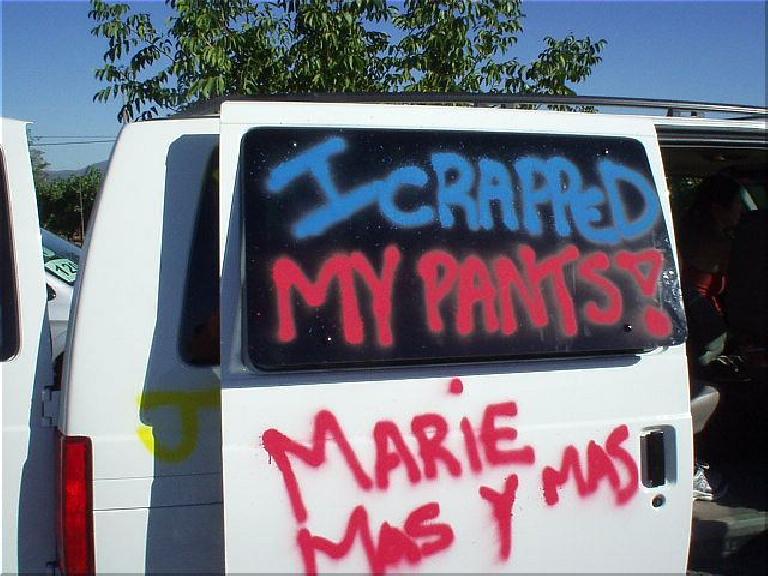 [Mile 26, 3:24 elapsed, 3:54 p.m.] "I crapped my pants!" was one of the many interesting things scrawled on other teams' vans.