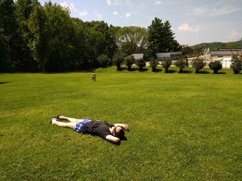 Maureen watching the total solar eclipse on grass near the Union Hills Golf Course in Pevely, Missouri.