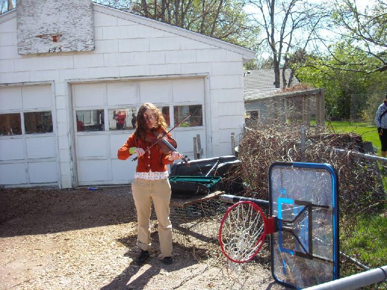 Another woman came and played the fiddle at various coops we visited.