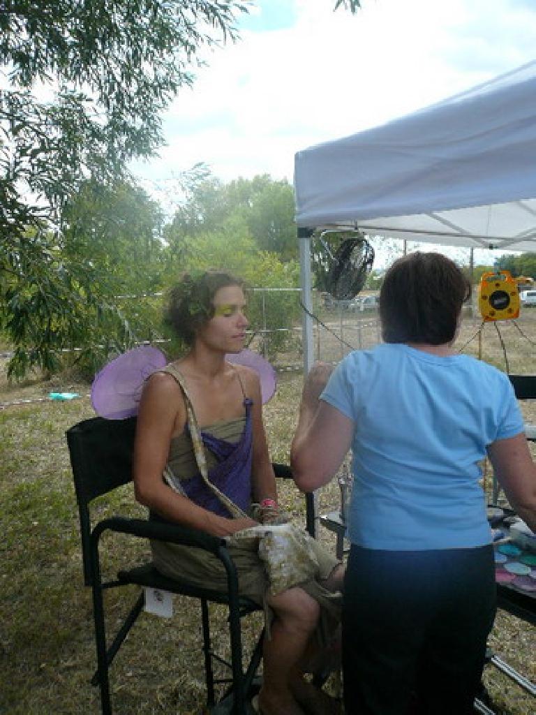 Leah getting face-painted.