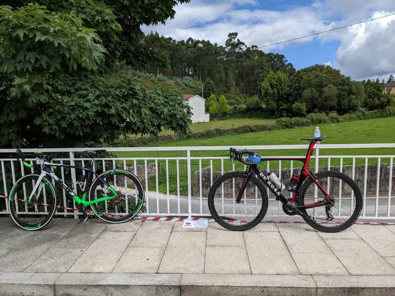 A green/black LaPierre and red/black De Rosa bicycle.