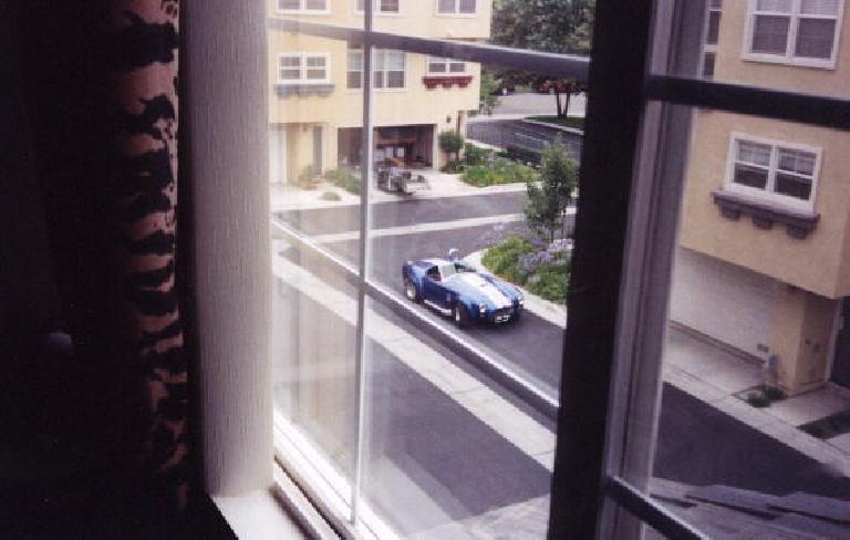 I awoke from bed only to see a beautiful blue AC Cobra replica right outside my house!