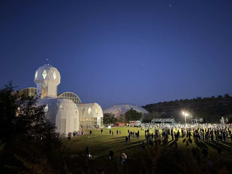 Runners hanging out outside of Biosphere 2 before the start of the Tucson Marathon.