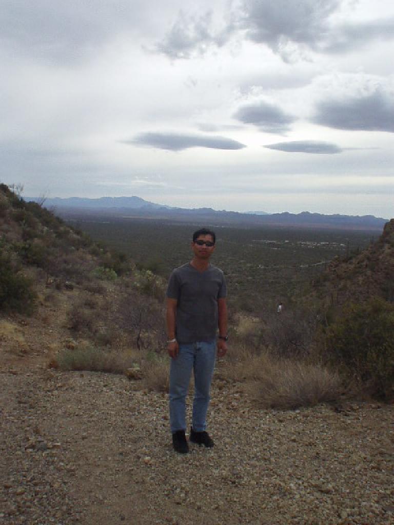 Felix Wong in Saguaro National Park, looking very dark and sunburned after Ironman Arizona the previous day.