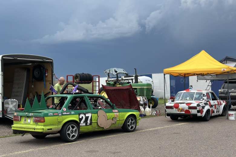 A BMW 325 with some sort of lizard and muscle theme, along with what I think is a polka-dotted Datsun. A BMW 325 with some sort of lizard and muscle theme, along with what I think is a polka-dotted Datsun.