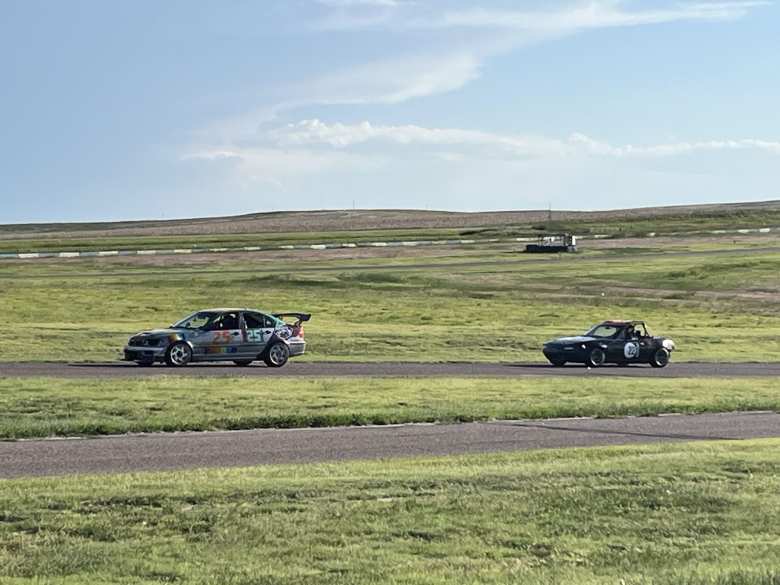 The #22 Miata back on the track during the final hour of Race Session 1 after receiving a new engine and transmission.
