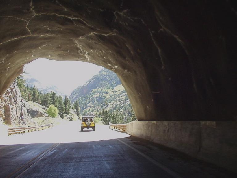 Following an Ouray Jeep Tours vehicle through a tunnel.