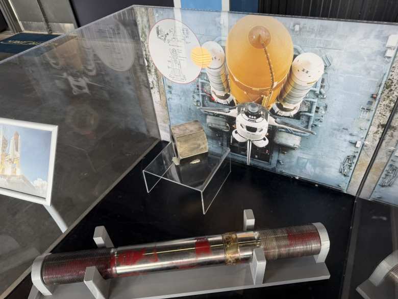 Eight of these hold-down bolts—each equipped with an explosive charge—held down the Space Shuttle assembly to the launch pad. When it was time to launch, the explosive charges were set off to break the bolts.