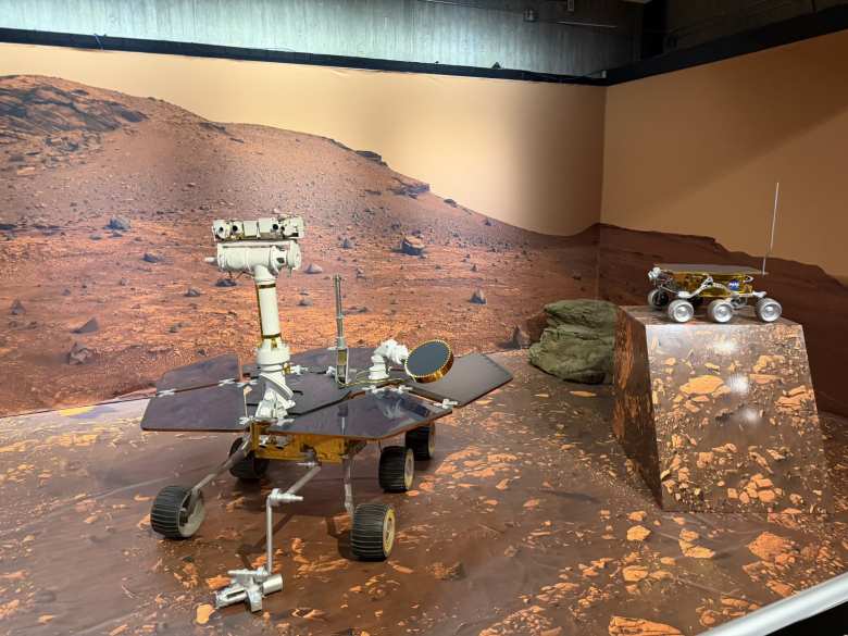 A full-scale model of the Spirit and Oportunity twins and Sojourner.